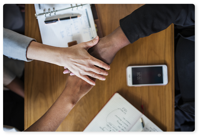 Mission - Diverse Business Team Stacking Hands